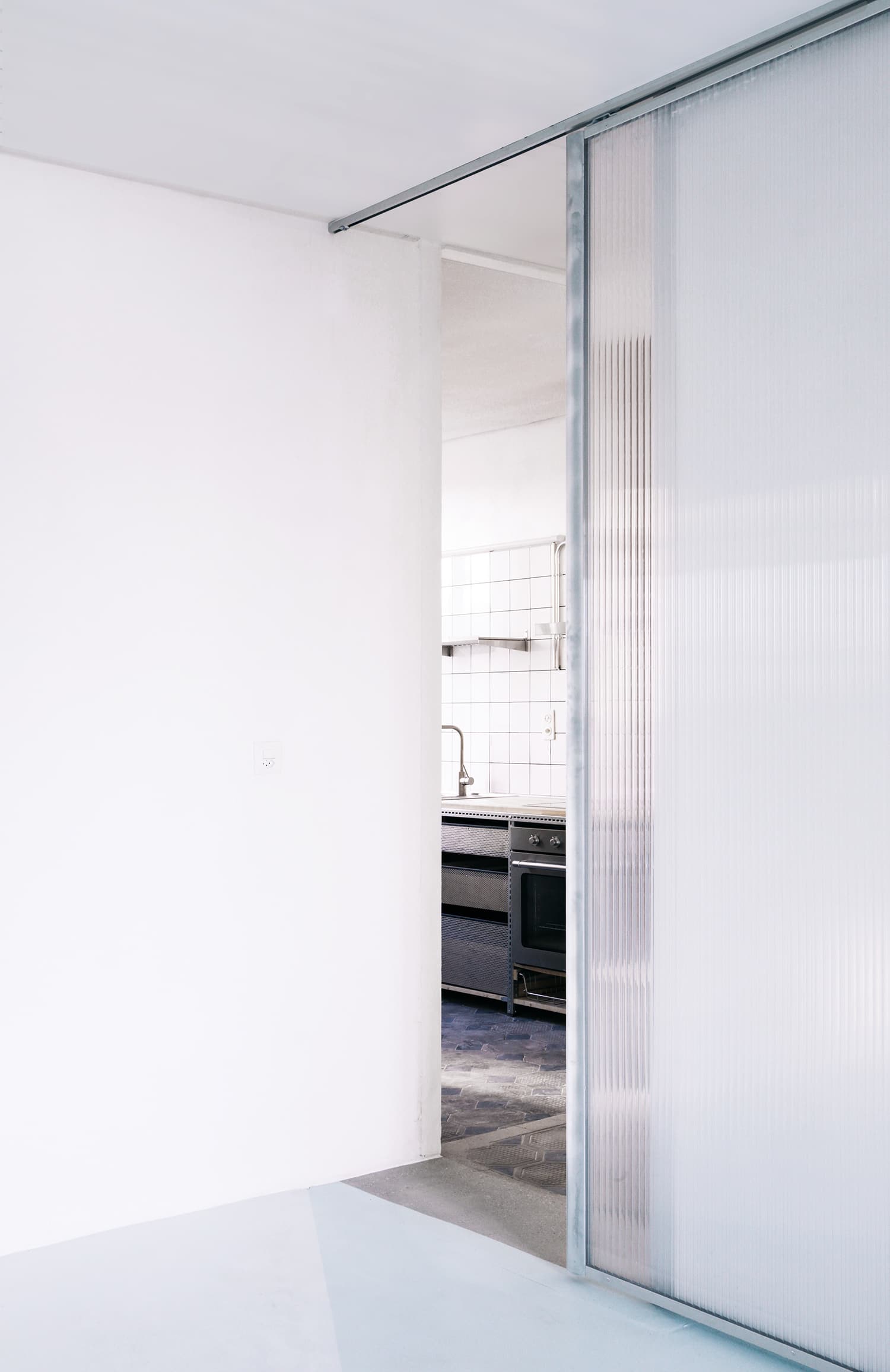 Sunset is the addition of winter gardens on a village house in Cernier, Switzerland