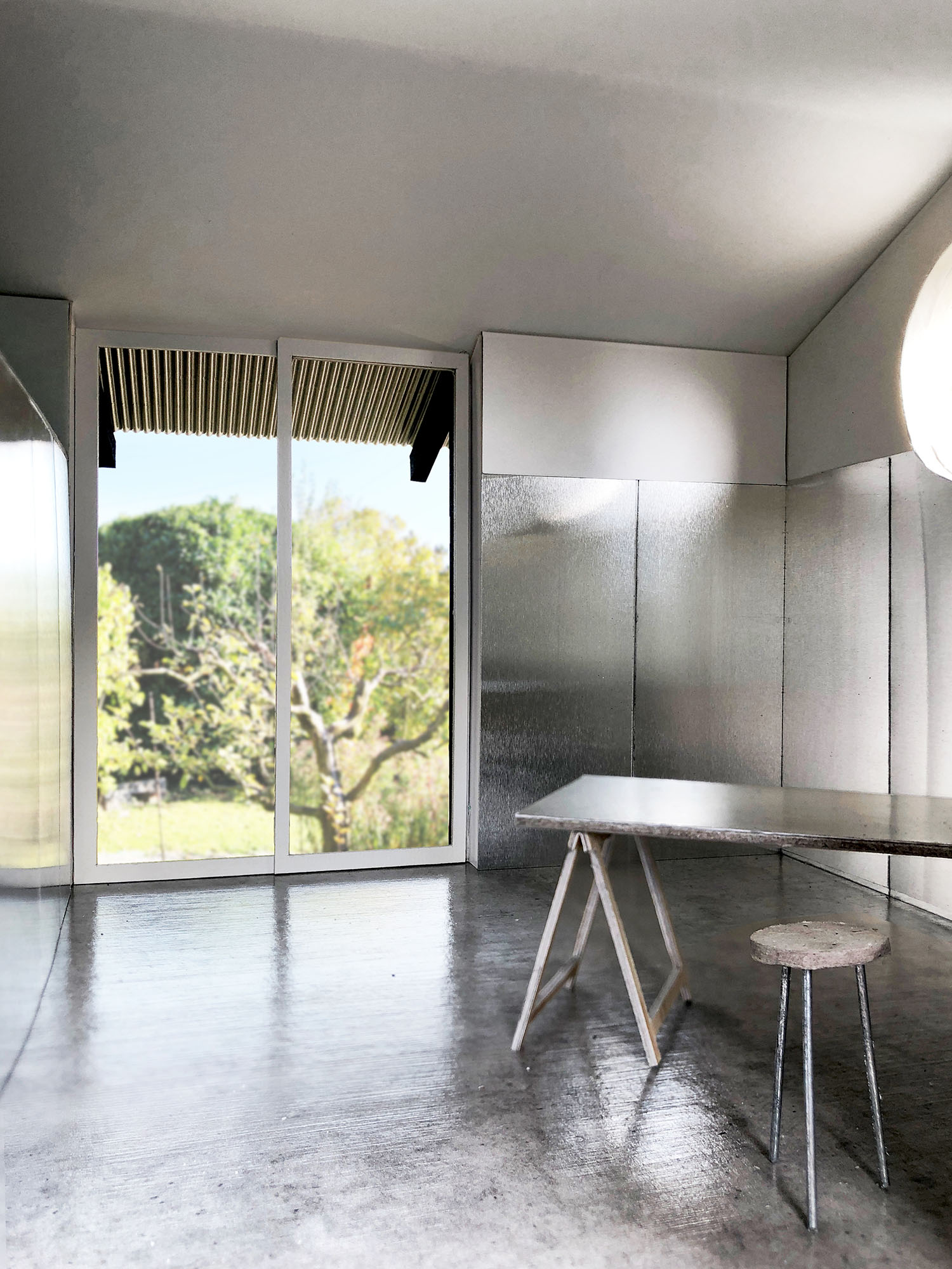 The Permanent Weekend House is a thin and long construction, extending an old chalet through its garden