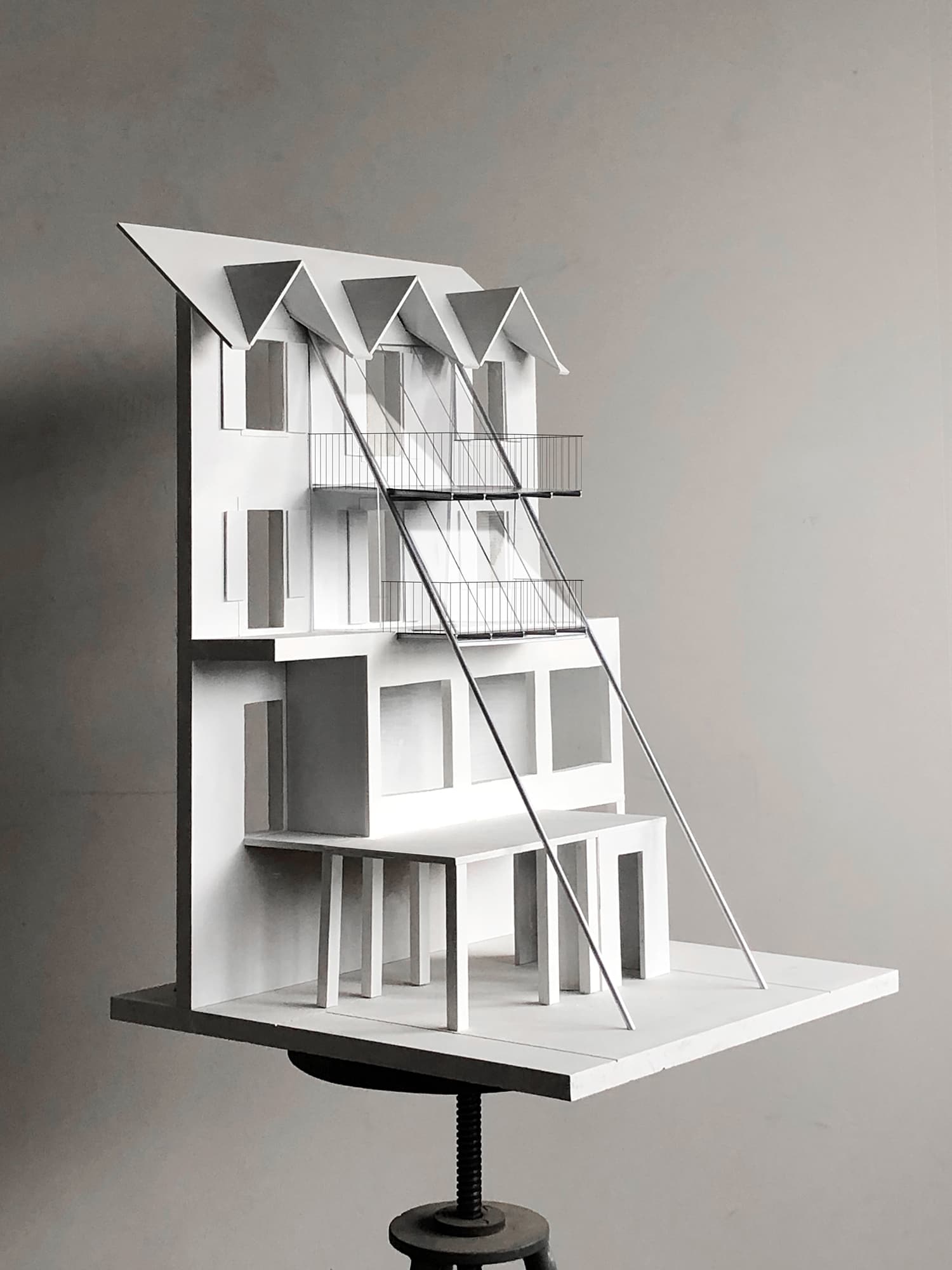 Sunset is the addition of winter gardens on a village house in Cernier, Switzerland